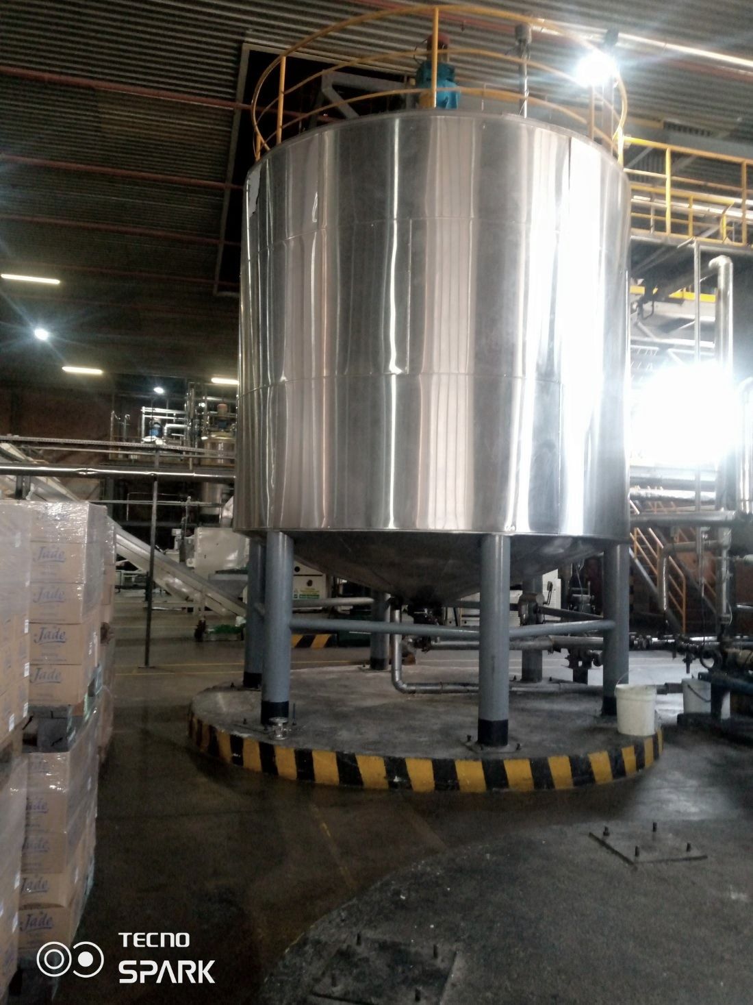 Stainless process tank on fabricated legs